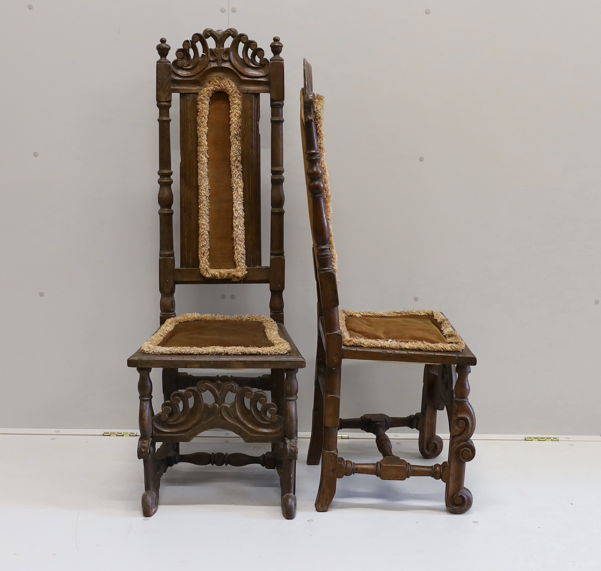 Two 18th century oak high back dining chairs, larger height 128cm